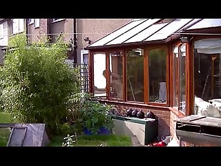 Susan cleaning the windows naked